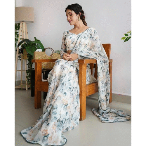 Side sitting pose highlighting floral design and adjustable fit of georgette ready to wear saree