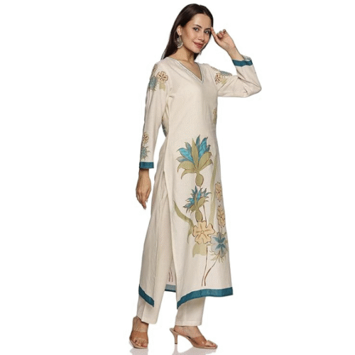 Complete kurta set for women with straight kurta and pant in cambric cotton, featuring hand block prints and stylish thread work.
